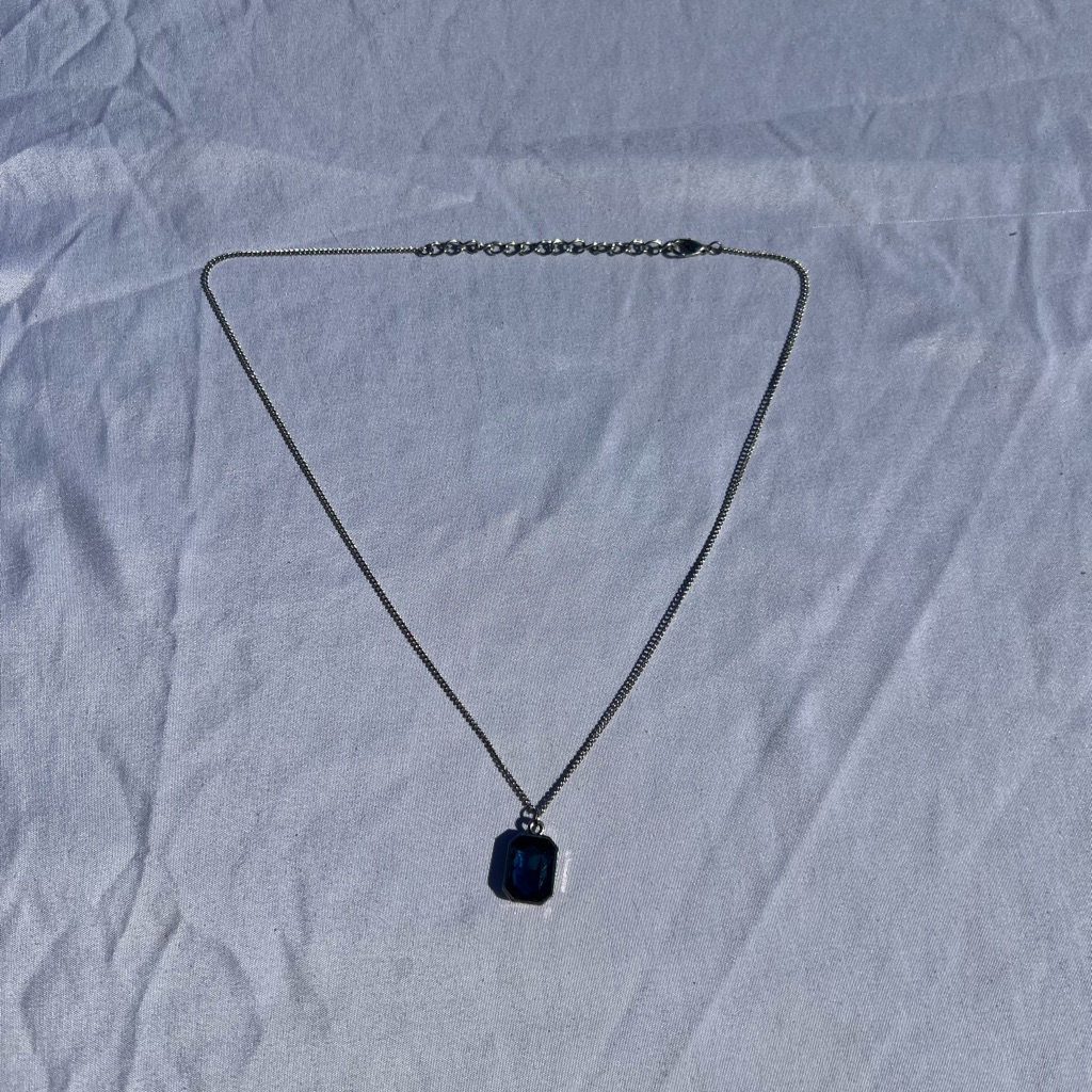 Elegant Silver Necklace With Blue Pendant